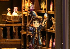 Jonge alchemist op een ladder voor de kast met drankjes